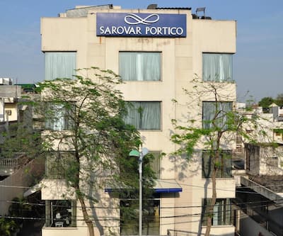 https://imgcld.yatra.com/ytimages/image/upload/t_hotel_yatra_city_desktop/v1432033653/Domestic Hotels/Hotels_New Delhi/Sarovar Portico Naraina/Overview.jpg